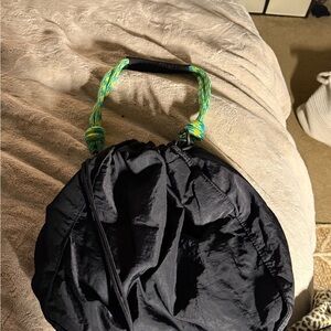 Elegant Black Shoulder Bag with Green Accents